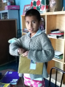 Karina binding a notebook