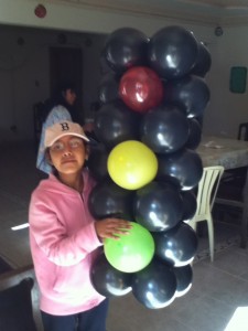 Kattia toting the mascot stop-light