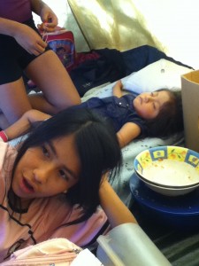 Catalina enjoying her afternoon siesta, and Johana finishing her meatballs.