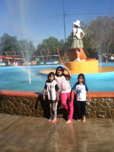 Alandra, Adriana, and Nohemi after jumping in the fountain.